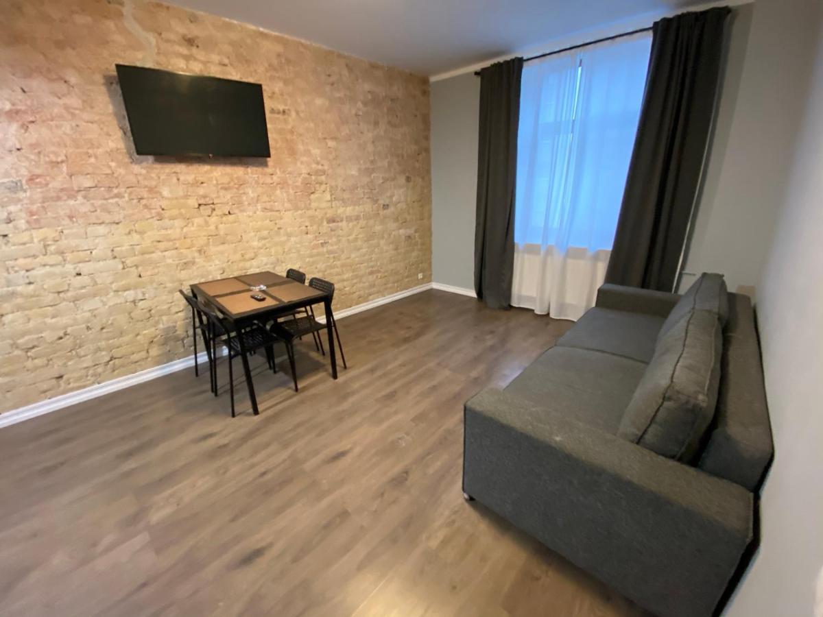 Aparthotel Riga Eksteriør bilde A living room in a typical apartment