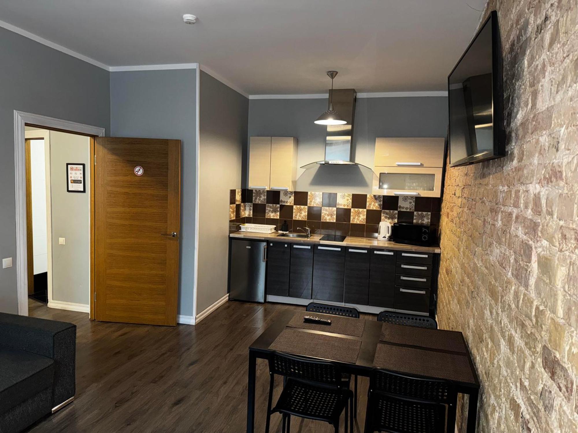 Aparthotel Riga Eksteriør bilde A typical apartment at the University of Applied Sciences and Medical University of Southern Tyrol
