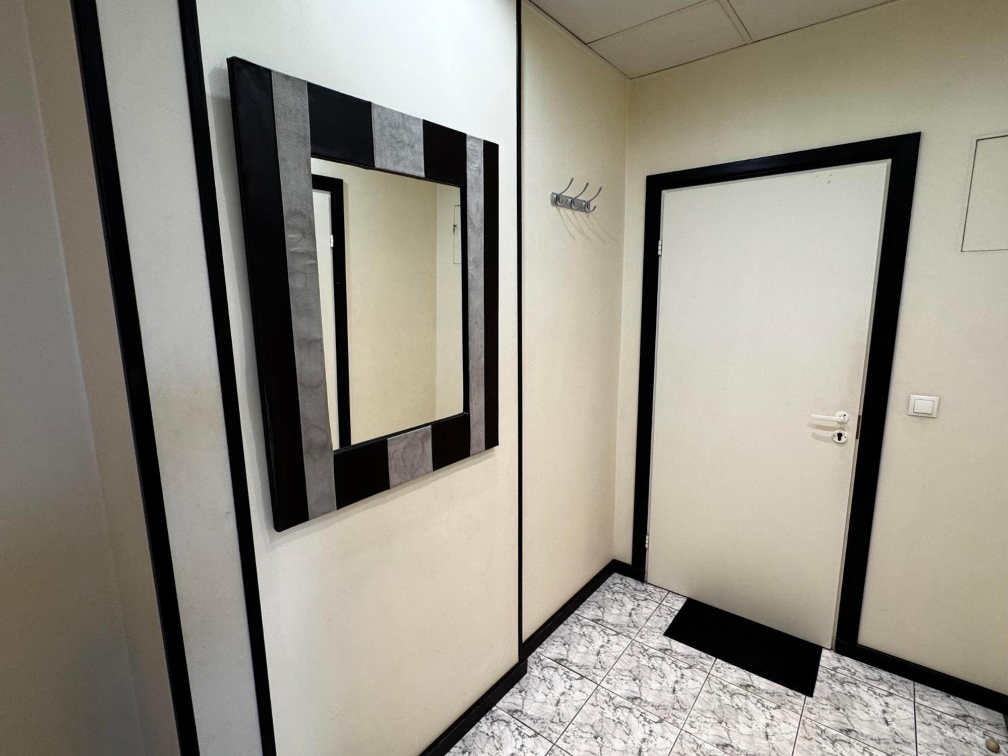 Aparthotel Riga Eksteriør bilde A mirror in a bathroom