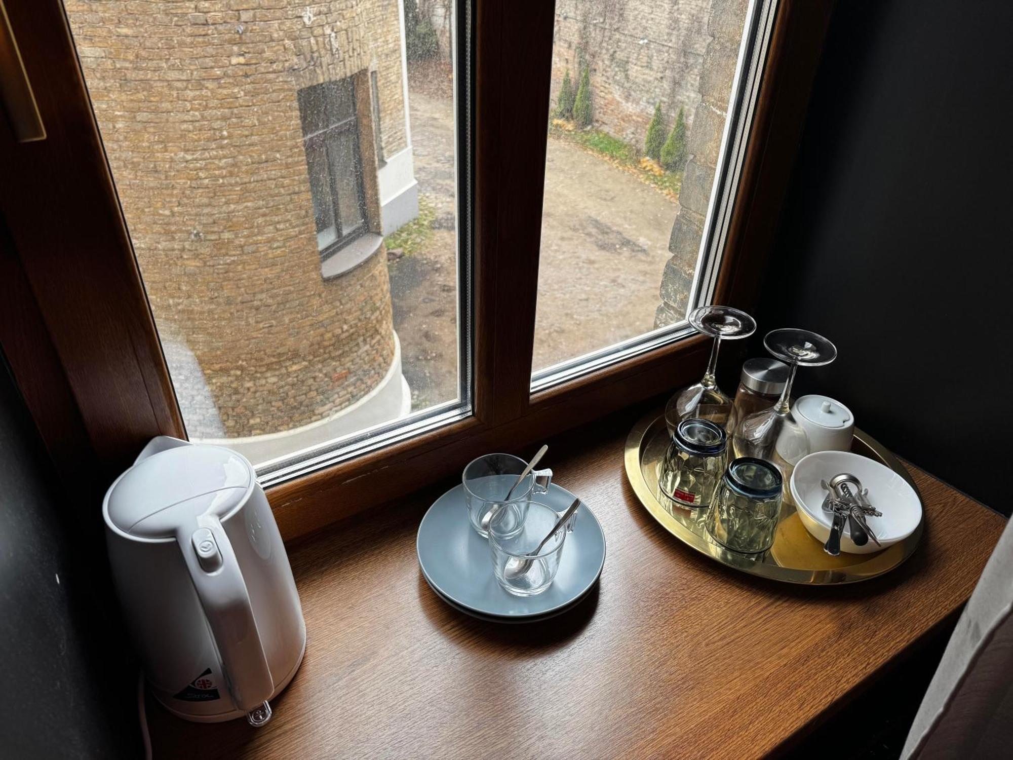 Aparthotel Riga Eksteriør bilde A tea tray in a hotel room